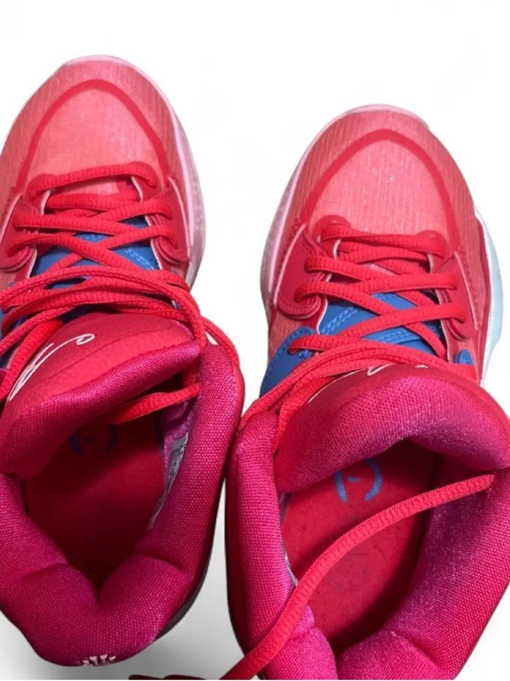 Nike mens Pink Red Basketball Sneakers with Blue Accents (NIKE KYRIE)